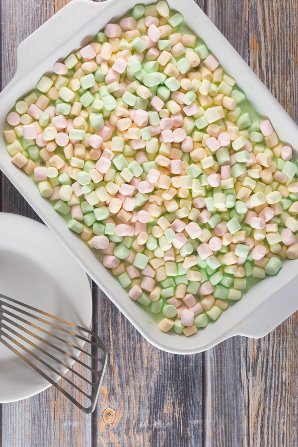 A simple and colorful Spring Jello Salad will be the highlight of your next big family meal. It's perfect for Easter or any spring holiday.