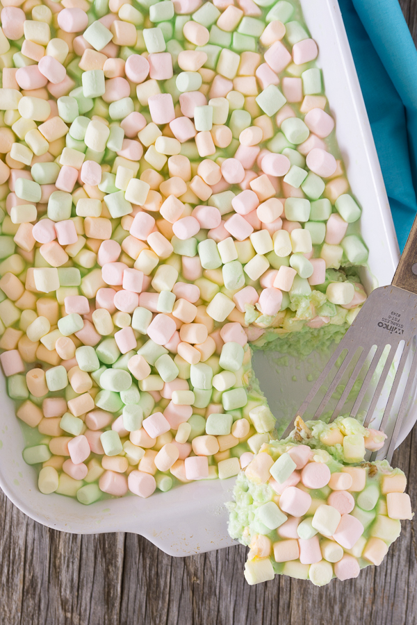 A simple and colorful Spring Jello Salad will be the highlight of your next big family meal. It's perfect for Easter or any spring holiday.