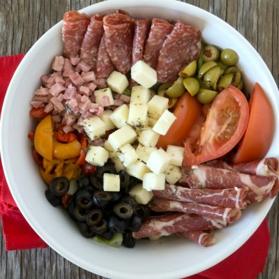 muffaletta salad in a white bowl