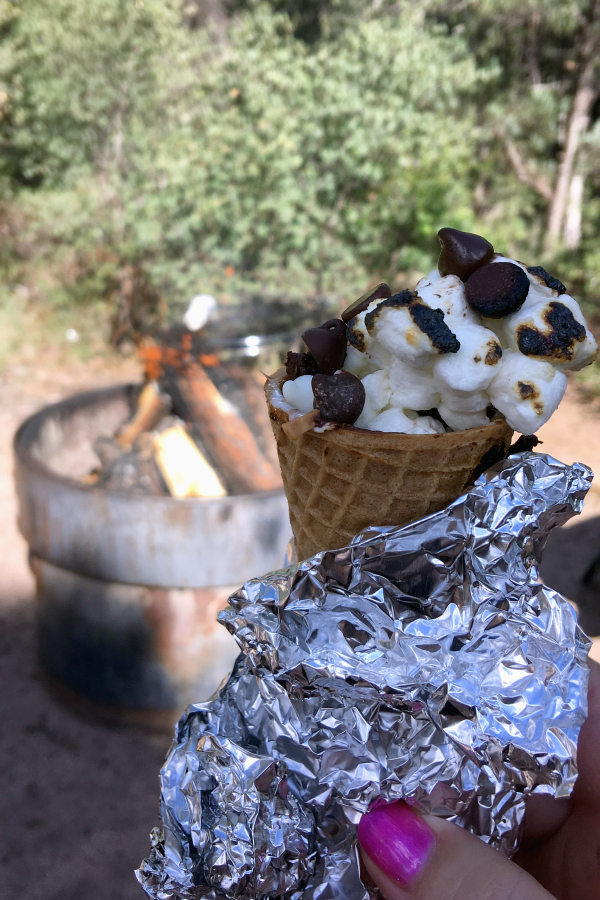 Kids of all ages will love making their own Campfire Ice Cream Cone Desserts on your next campout.