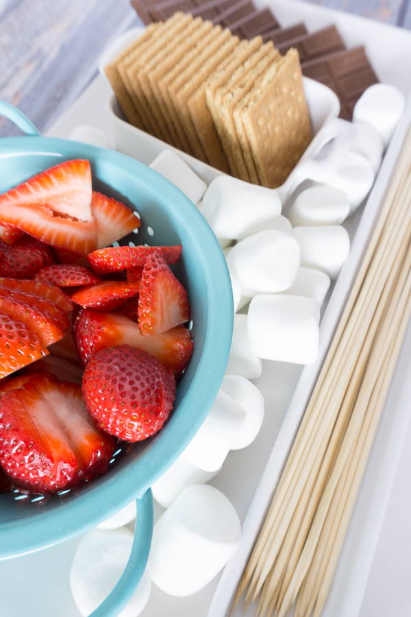 These Chocolate Covered Strawberry S'mores are everything you love about chocolate covered strawberries and everything you love about S'mores combined into one ultimate summertime dessert.