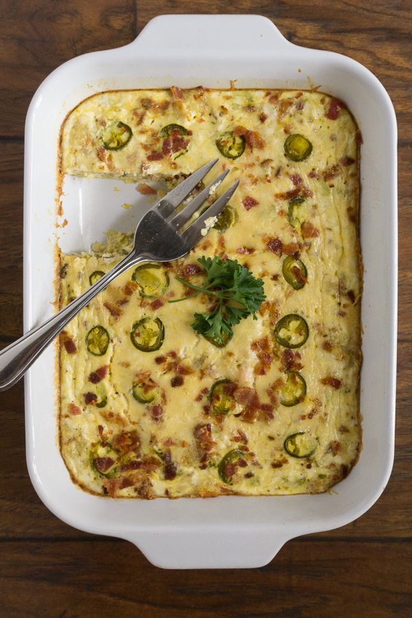 Rise and shine with this delicious Jalapeno Bacon Egg Bake. It's full of bacon, cheesy goodness and great for a late weekend breakfast and absolutely perfect for a potluck!