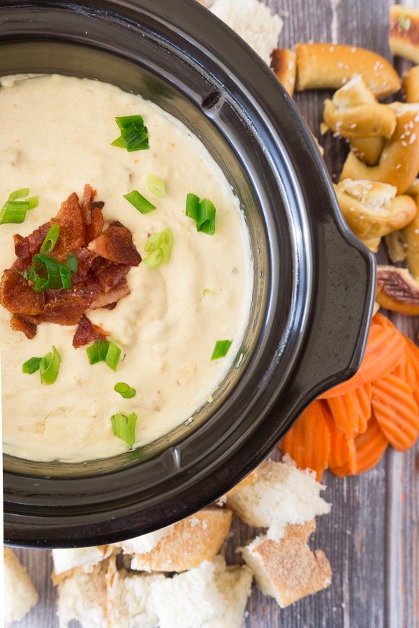 My Slow Cooker Cheddar Bacon Dip is the perfect after school snack or appetizer for the big game. Heck, I make it on the weekends to go with lunch sometimes...it's that good!