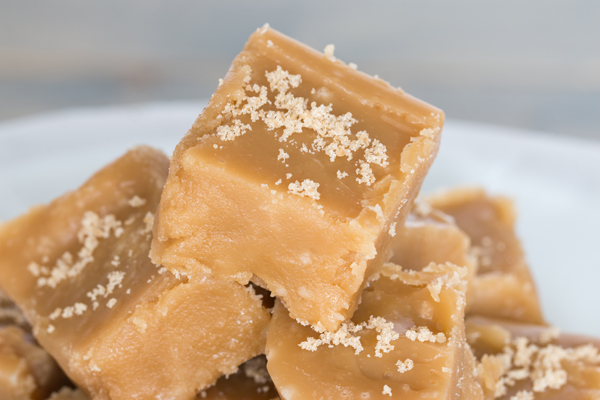 This Brown Sugar Fudge Recipe only needs 4 ingredients, 10 minutes, and a little patience until the first sweet, heavenly bite. It's fudge perfection!