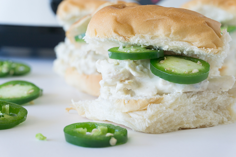 Loads of cream cheese and just the right amount of jalapeno will make these Slow Cooker Jalapeno Popper Sandwiches disappear before you know it!