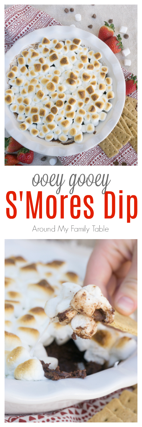Ooey gooey S'mores Dip will be your new family favorite!  A blend of chocolate and heavy cream that's topped with roasted marshmallows makes a scrumptious dessert! #smores #desserts #smoresdip #chocolatedessert