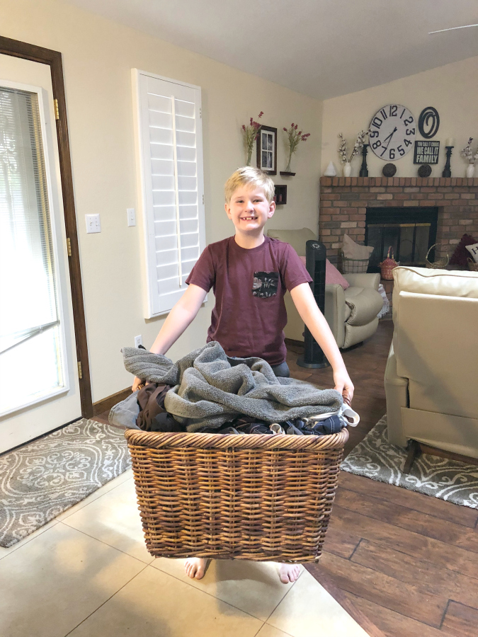 Learn how to simplify laundry day and organize your laundry area. I have several manageable solutions for your next laundry day. You'll love my Simplified Laundry System for Busy Families that includes a free Laundry Stain Removal Guide printable.