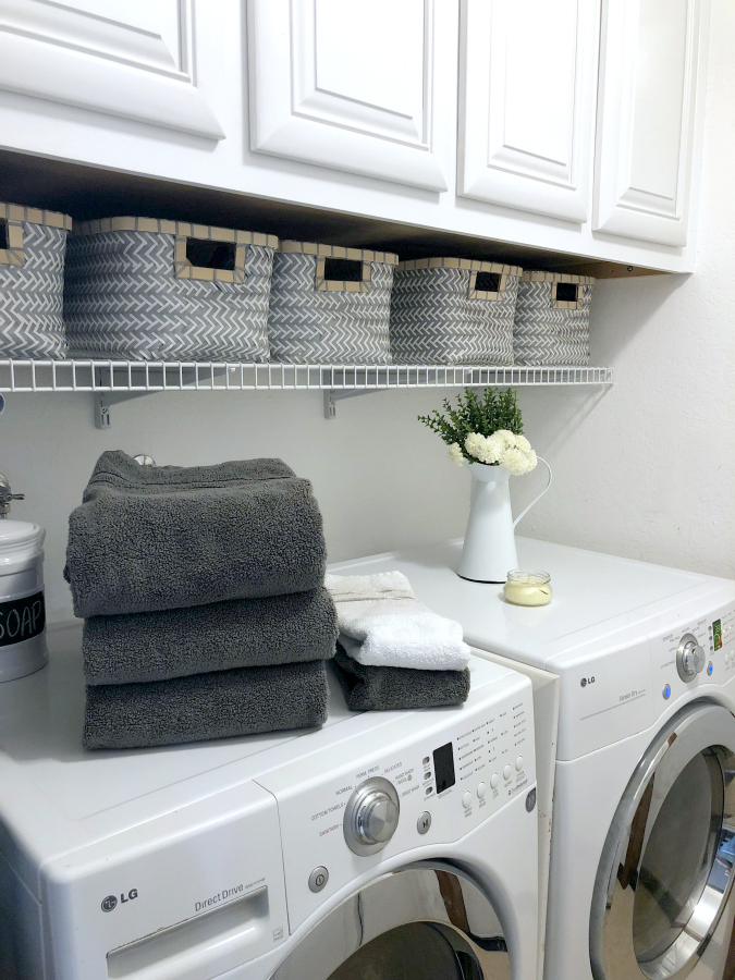 Learn how to simplify laundry day and organize your laundry area. I have several manageable solutions for your next laundry day. You'll love my Simplified Laundry System for Busy Families that includes a free Laundry Stain Removal Guide printable.