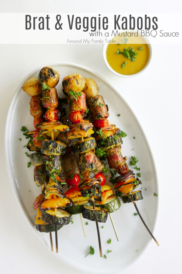 Fire up the grill for these Brat & Vegetable Kabobs with Mustard BBQ Sauce.  The Mustard BBQ sauce adds a tangy twist to the kabobs.  It's the perfect glaze for the brat kabobs since nothing pares better with a grilled brat than some yellow mustard.