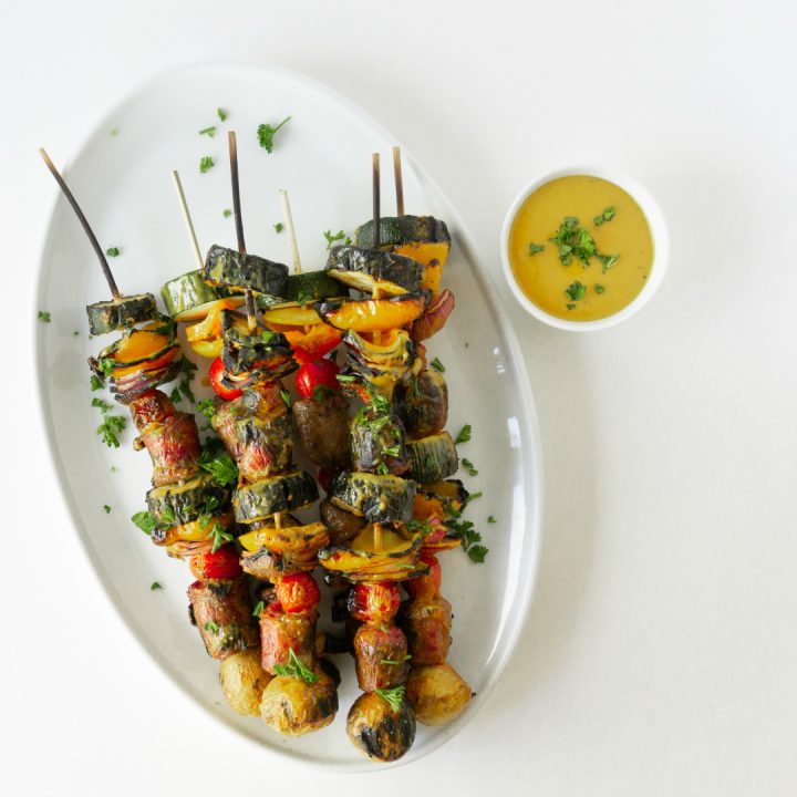 Fire up the grill for these Brat & Vegetable Kabobs with Mustard BBQ Sauce.  The Mustard BBQ sauce adds a tangy twist to the kabobs.  It's the perfect glaze for the brat kabobs since nothing pares better with a grilled brat than some yellow mustard.