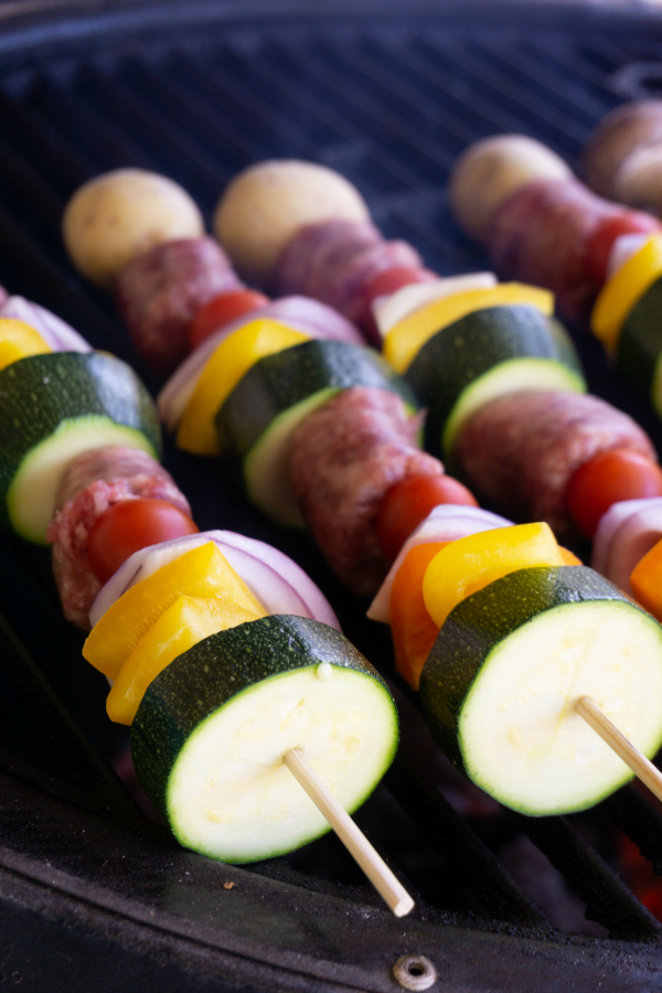 Fire up the grill for these Brat & Vegetable Kabobs with Mustard BBQ Sauce.  The Mustard BBQ sauce adds a tangy twist to the kabobs.  It's the perfect glaze for the brat kabobs since nothing pares better with a grilled brat than some yellow mustard.