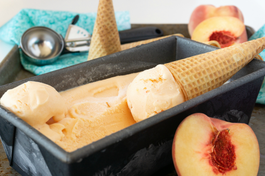 Grab an ice cream cone because this 2-ingredient, no churn peach ice cream is the easiest and The Best Peach Ice Cream Ever!