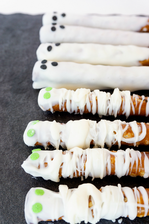 Ghost & Mummy Halloween Pretzels are salty, sweet, and make a creepy-cute surprise for friends and trick-or-treaters alike.