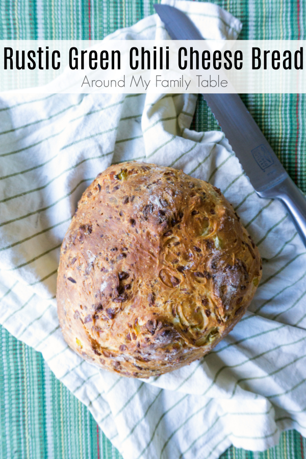 This Rustic Green Chile Cheese Bread is such an easy bread to make and has such great flavor from the cheese and chiles and such a nice texture.  Cooking it without a pan and in a wood fired pizza oven gives it a rustic feel. 