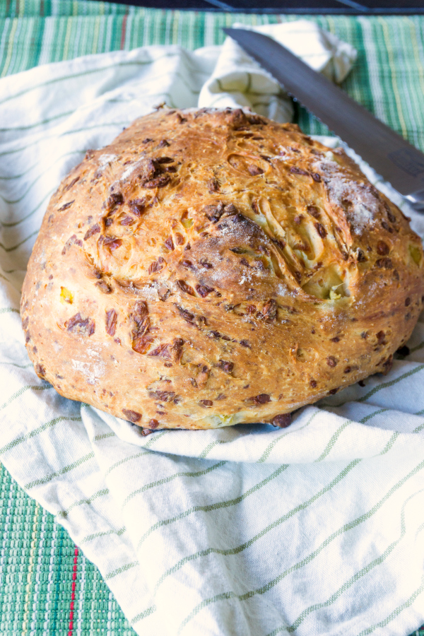 This Rustic Green Chile Cheese Bread is such an easy bread to make and has such great flavor from the cheese and chiles and such a nice texture.  Cooking it without a pan and in a wood fired pizza oven gives it a rustic feel. 