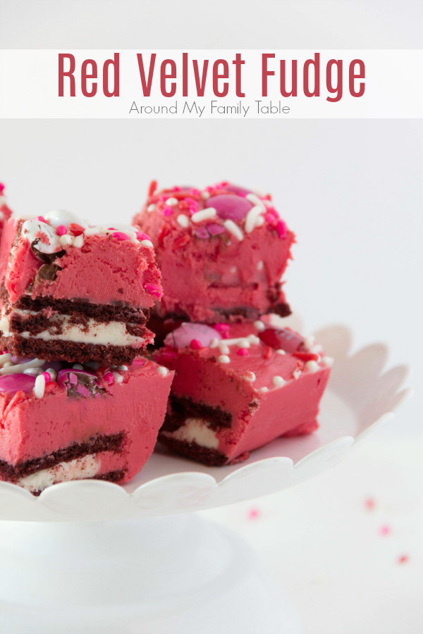 This Red Velvet Fudge is layered with chocolate sandwich cookies and loads of Valentine chocolates and sprinkles. It's a simple gourmet fudge recipe that is festive and delicious.