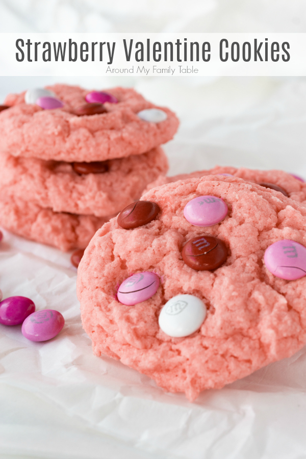 Celebrate your love with a batch of Strawberry Valentine Cookies. These cake mix cookies have a light strawberry flavor and topped off with valentine chocolate candies, sort reminds me of chocolate covered strawberries.