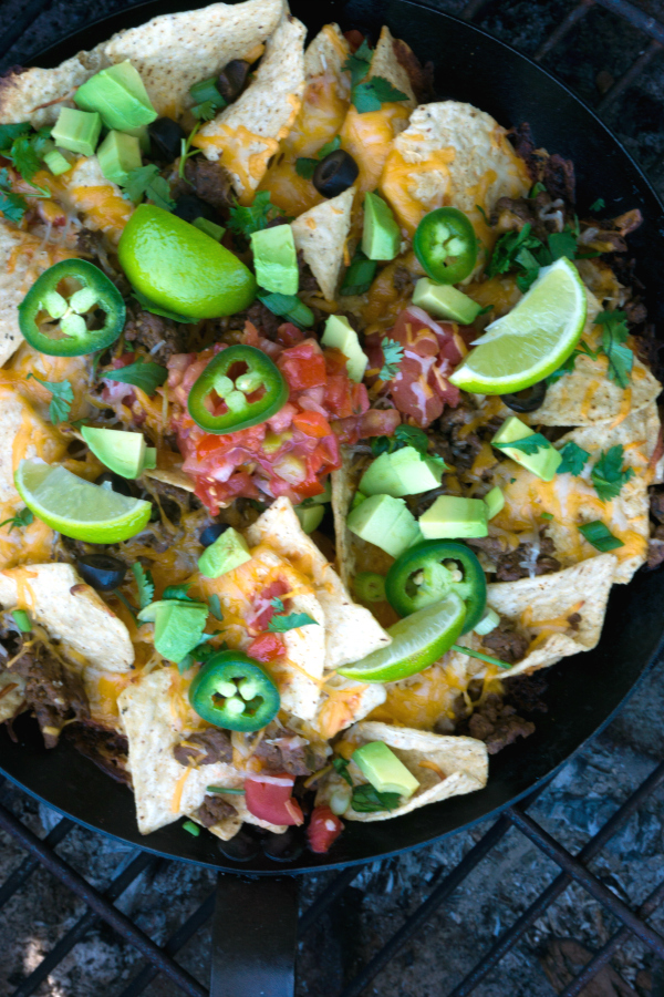 These Beefy Campfire Nachos are ready in 15 minutes and make a great lunch, dinner, or even an afternoon snack whether you are camping or not! They are also a great way to use up leftovers.