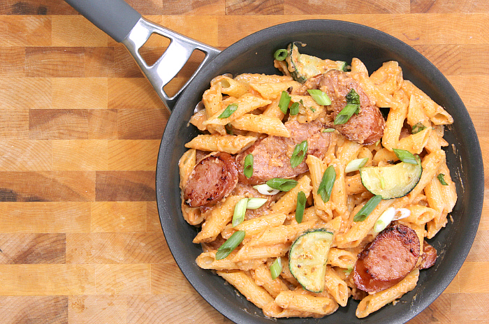 This spicy Sriracha Cream Sauce with Kielbasa is total comfort food and is on the table in under 30 minutes, including the pasta!