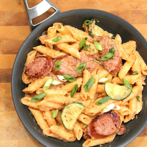 This spicy Sriracha Cream Sauce with Kielbasa is total comfort food and is on the table in under 30 minutes, including the pasta!