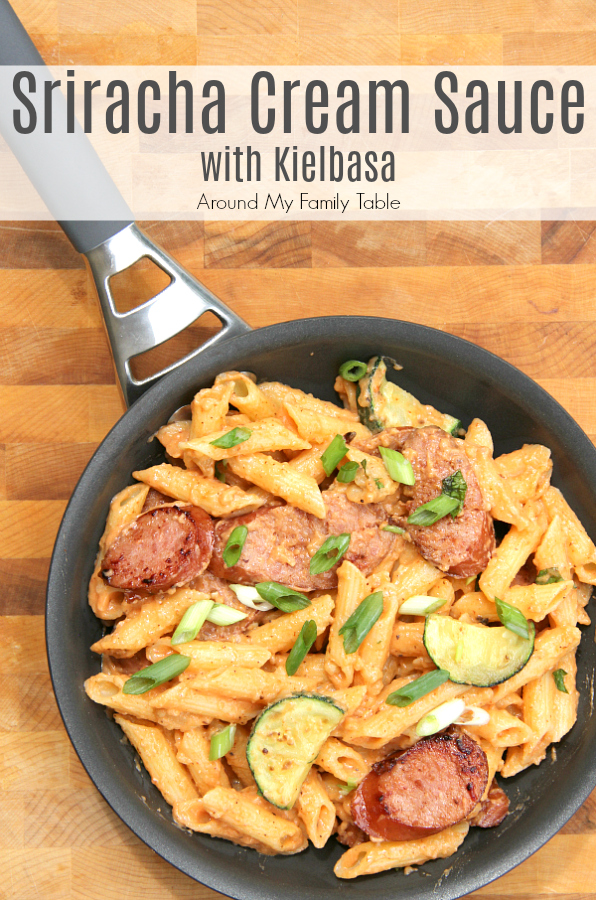 This spicy Sriracha Cream Sauce with Kielbasa is total comfort food and is on the table in under 30 minutes, including the pasta! via @slingmama