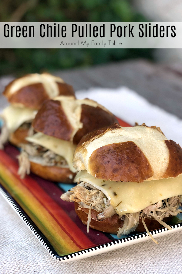 pulled pork sandwiches on striped plate