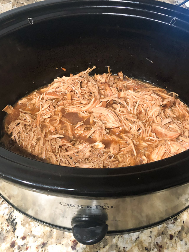 shredded teriyaki chicken in a slow cooker