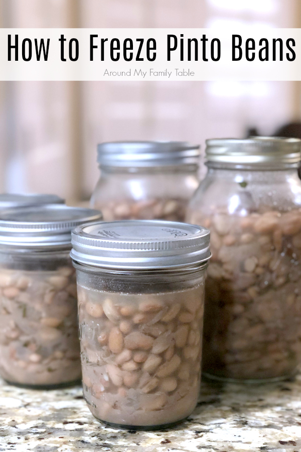 cooked pinto beans in mason jars