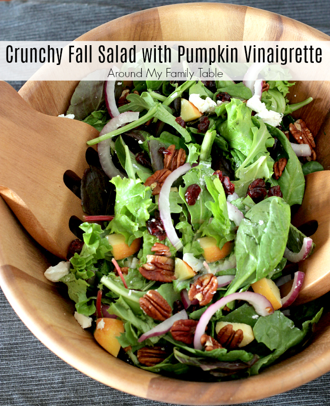 This Crunchy Fall Salad is a refreshing fall salad for the holidays that's been tossed in an unbelieveale Pumpkin Vinaigrette. via @slingmama