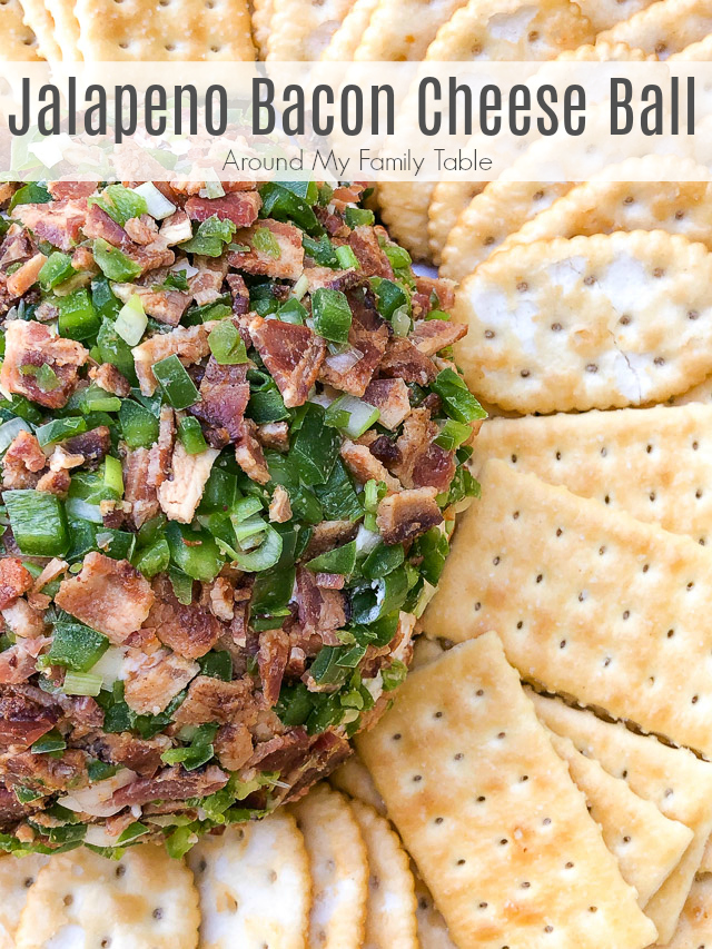 Jalapeño Bacon Cheese Ball on a white platter with crackers