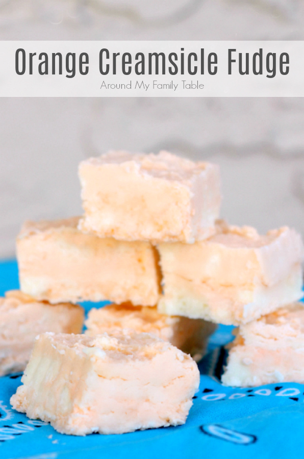 Orange Creamsicle Fudge takes just a few minutes to make and tastes just like an orange creamsicle ice cream! via @slingmama