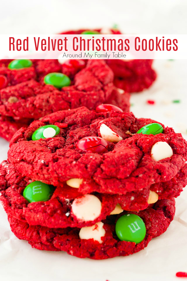 Red velvet Christmas cookies bring a festive touch to your holiday cookie platter! They're soft, chewy cookies with green M&M's and white chocolate chips. #christmascookies #redvelvet via @slingmama