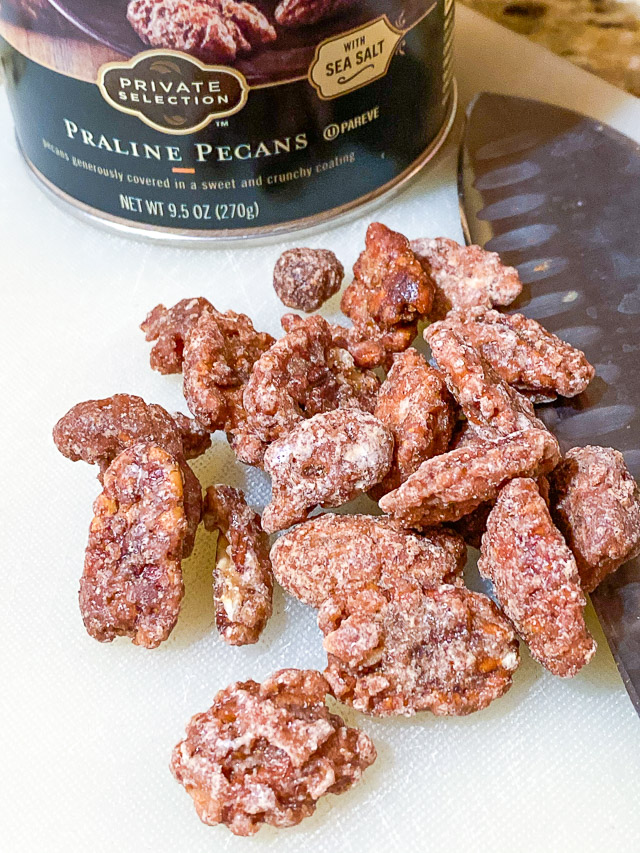 candied pecans on cutting board