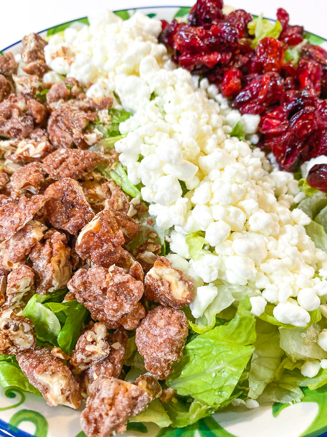 Cranberry, Goat Cheese, & Pecan Salad in a bowl 