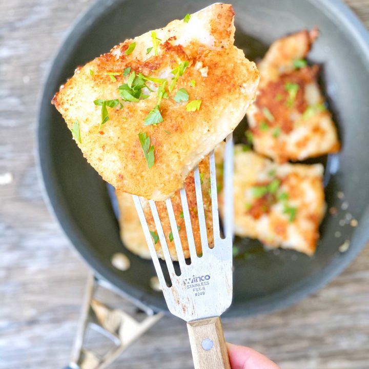 parmesan crusted cod in a frying pan