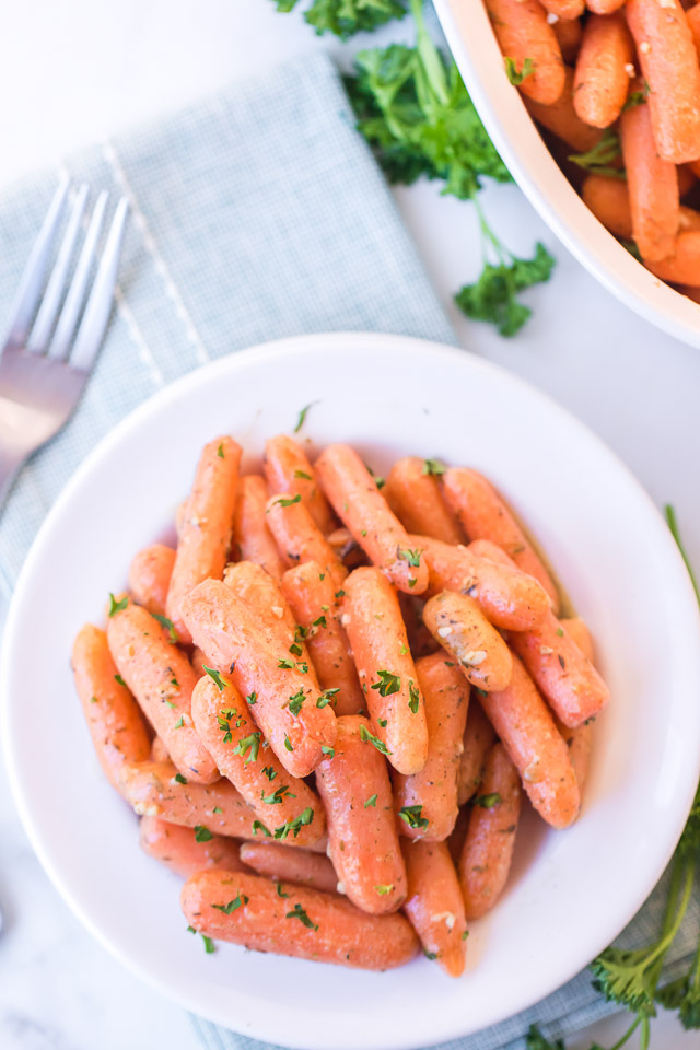 roasted baby carrots on white plate