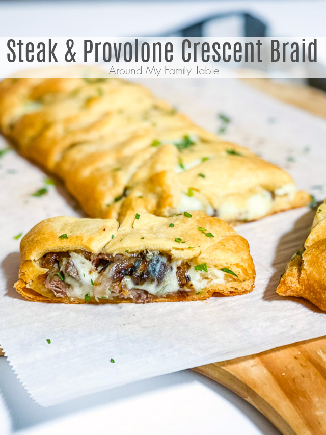 Steak & Provolone Crescent Braid on parchment paper on a pizza peel