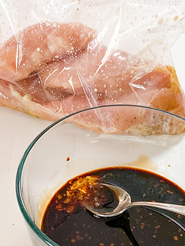 Balsamic Marinated Chicken...chicken in a bag and marinade in a glass bowl