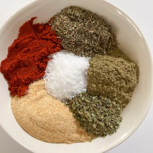 pork chop seasoning ingredients in a white bowl