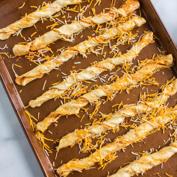 southwestern cheese breadsticks on baking sheet