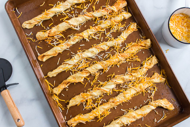 southwestern cheese breadsticks on baking sheet