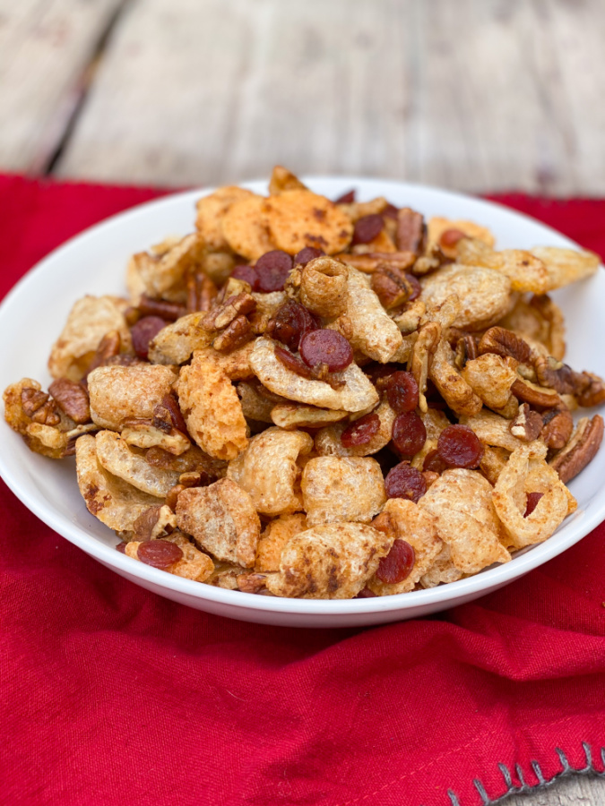 Low Carb Keto Snack Mix in a white bowl on a red napkin