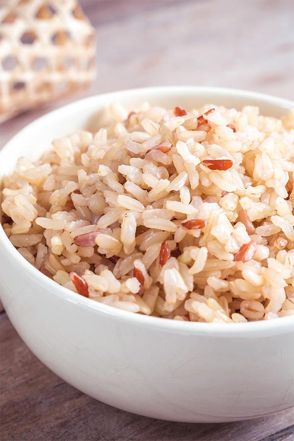 cooked brown rice in a white bowl