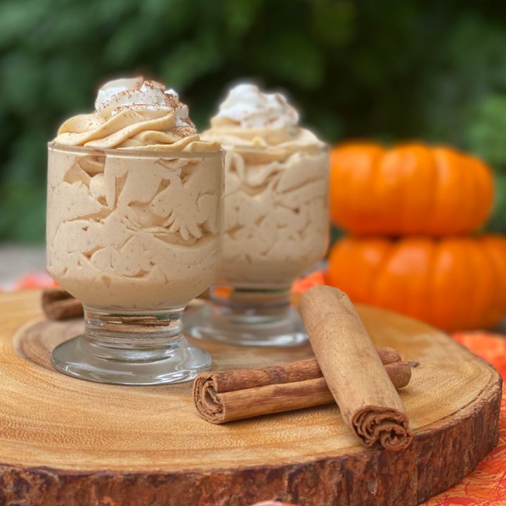 keto pumpkin mousse in serving dishes on wood