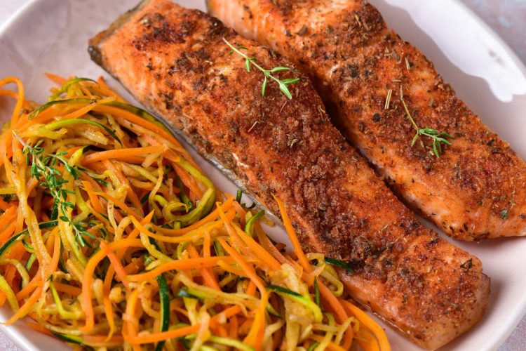 air fryer keto salmon and zoodles on white plate