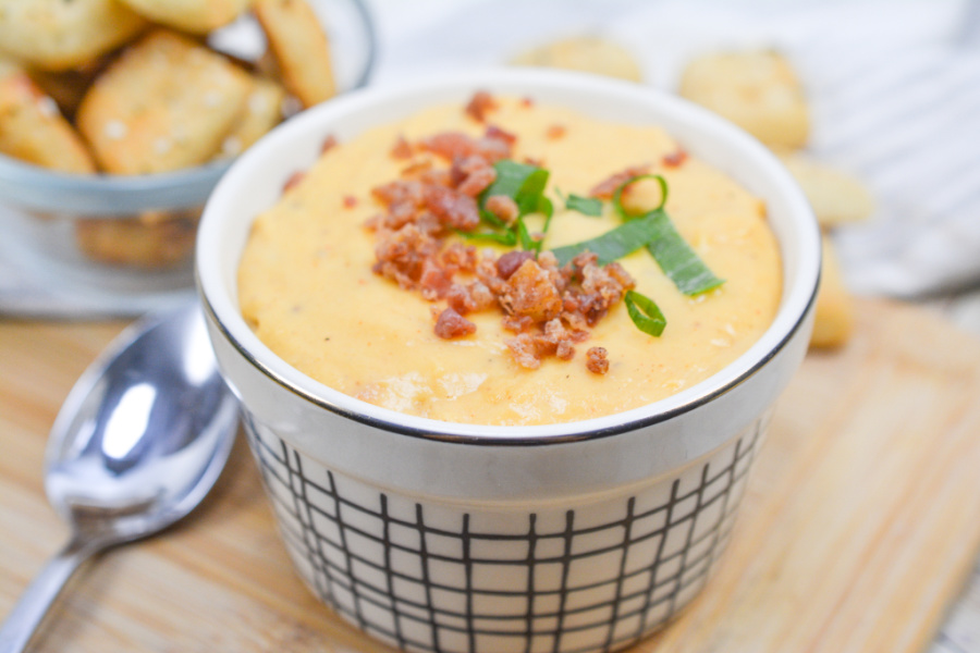 keto beer cheese in a bowl with keto pretzels