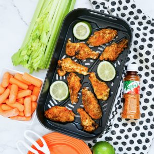 crispy tajin chicken wings in air fryer basket