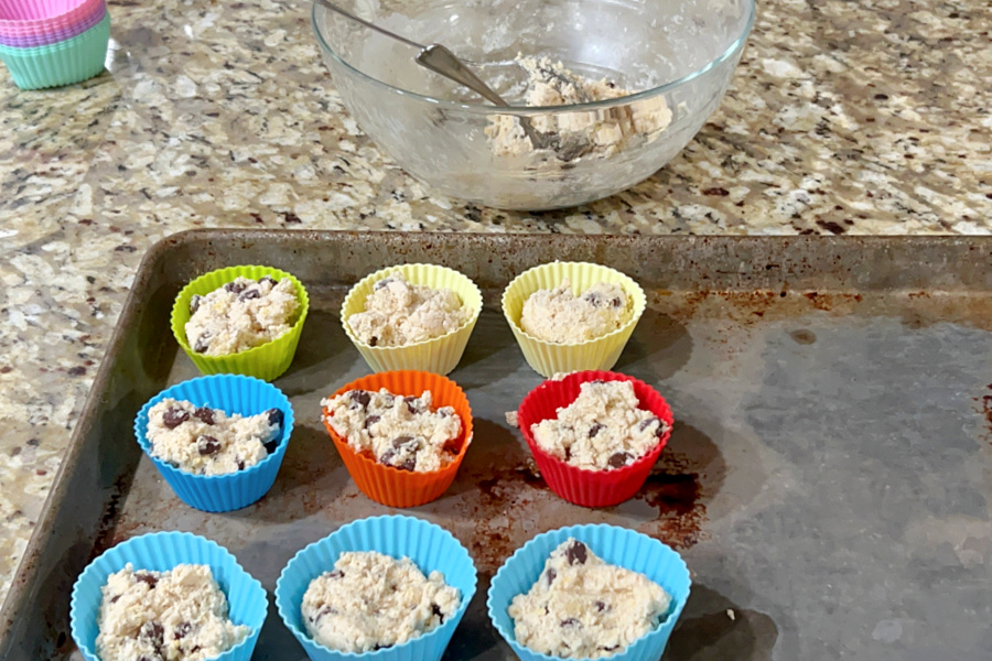 keto chocolate chip muffin batter in silicone muffin tins